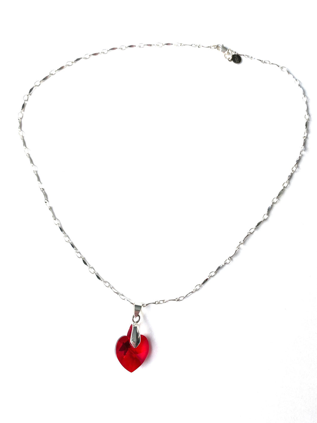 Ruby's Heart - a Fine Crystal Heart-shaped Pendant dazzles on a Silver Chain