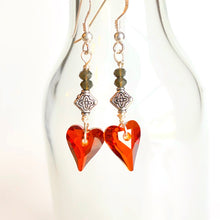 Load image into Gallery viewer, A radiant red crystal heart dangles from gray quartz and Sterling Silver ear wires. Simple, stately sentiment of love.   Collection: Jo Color: Red Drop Length: 2 inches Materials: Swarovski crystal, quartz Metals: mixed, .925 Sterling Silver ear wires
