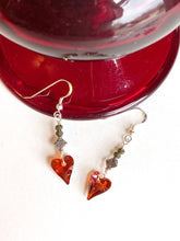 Load image into Gallery viewer, A radiant red crystal heart dangles from gray quartz and Sterling Silver ear wires. Simple, stately sentiment of love.   Collection: Jo Color: Red Drop Length: 2 inches Materials: Swarovski crystal, quartz Metals: mixed, .925 Sterling Silver ear wires
