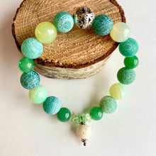 Load image into Gallery viewer, Breathe deep your favorite essential oil (1-2 drops applied to white Lava bead charm) all day long. Rich green Aventurine and Agate beads and chips surround a silver Filigree bead.  Type: Diffuser Stretch Bracelet Size: 6 Bead sizes: 8mm, 10mm
