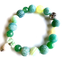 Load image into Gallery viewer, Breathe deep your favorite essential oil (1-2 drops applied to white Lava bead charm) all day long. Rich green Aventurine and Agate beads and chips surround a silver Filigree bead.  Type: Diffuser Stretch Bracelet Size: 6 Bead sizes: 8mm, 10mm
